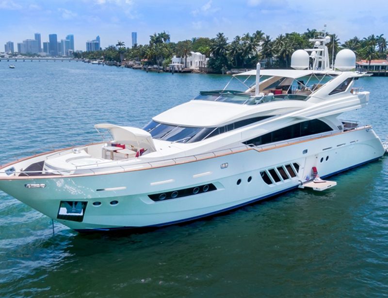 The 100 Dominator motor yacht at anchor with her tender alongside