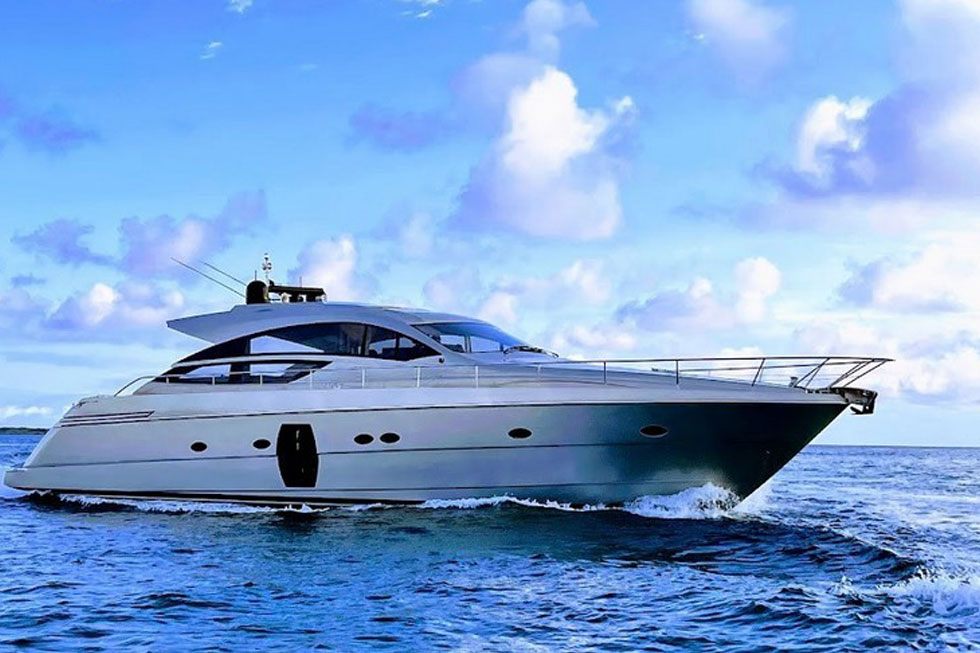 The 64 Pershing motor yacht under way on open blue water