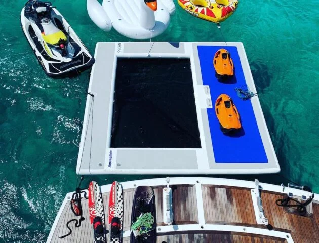 Swim platform of the 68 Sunseeker Manhattan with seabobs, water skis and a jet ski alongside