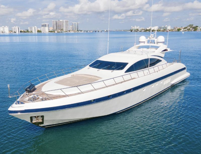 Long white profile of the 92 Mangusta motor yacht lying at anchor