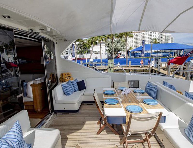Aft deck of the 92 Mangusta with the table set for lunch