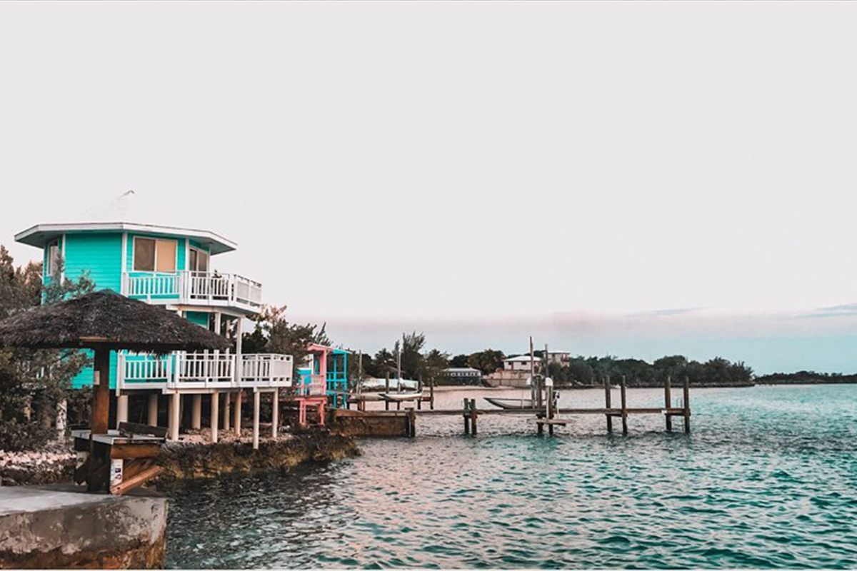 The waterfront buildings of Staniel Cay Yacht Club seen from the water